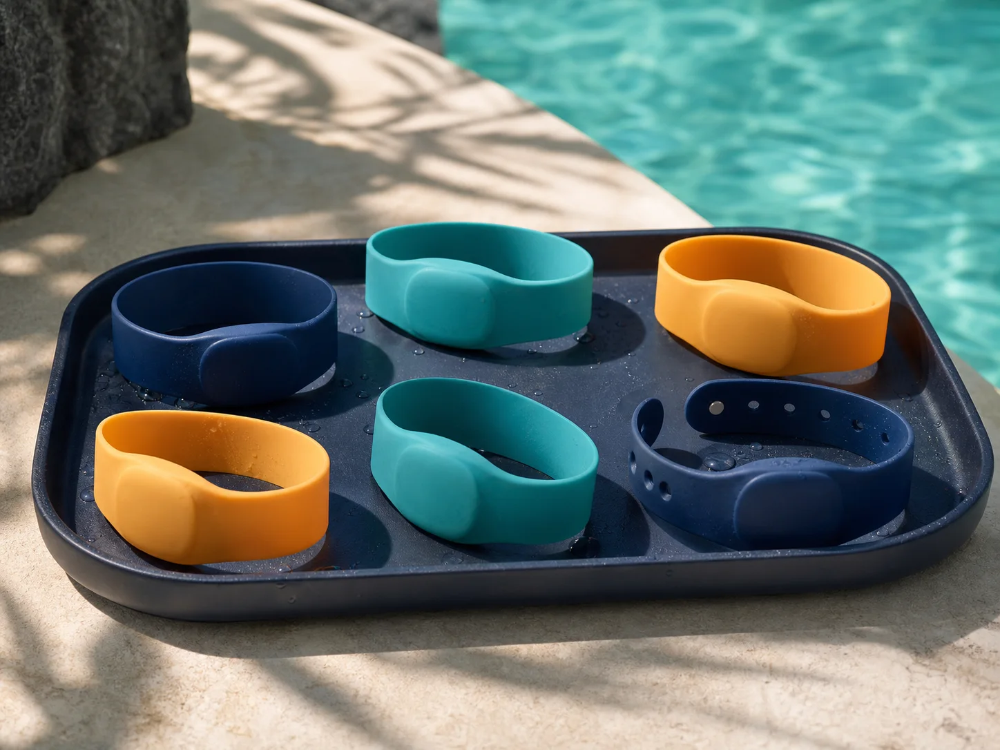 Counted set of silicone RFID wristbands in an unbranded issue tray